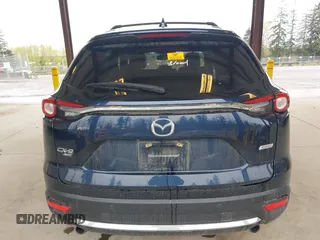 2018 Mazda CX-9 Grand Touring with VIN JM3TCBDY0J0216195, listed as a IAAI auction lot 41976122 with 90,083 mi miles and . Bid and sale history available at carsss.com. Image 16.