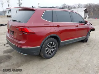 2020 Volkswagen Tiguan SE with VIN 3VV2B7AX2LM018722, listed as a IAAI auction lot 41802291 with 58,914 mi miles. Bid and sale history available at carsss.com. Image 4.