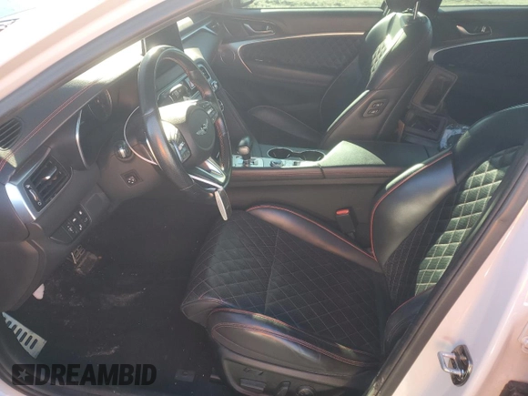 2019 Genesis G70 3.3T Advanced with VIN KMTG34LE4KU014808, listed as a Copart auction lot 87353044 with 57,050 mi miles and Salvage Title. Bid and sale history available at carsss.com. Image 7.