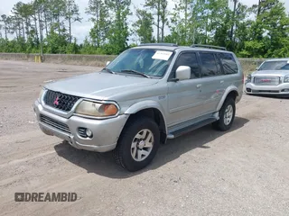 2001 Mitsubishi Montero Limited z VIN JA4LS41R41P013333, wystawiony jako IAAI lot #42361683 z przebiegiem 257 906 mil mil oraz . Historia ofert i sprzedaży dostępna na DreamBid. Obrazek 2.