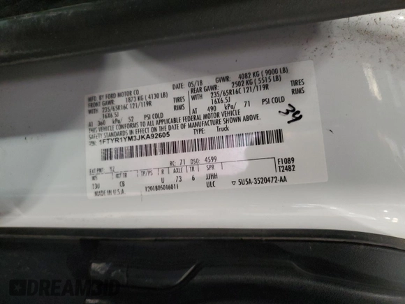 2018 Ford Transit z VIN 1FTYR1YM3JKA92605, wystawiony jako Copart lot #57334985 z przebiegiem 61 538 mil mil oraz Szkoda całkowita • Salvage title. Historia ofert i sprzedaży dostępna na DreamBid. Obrazek 13.