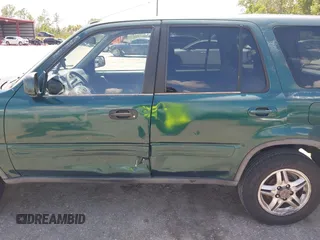 2000 Honda CR-V SE z VIN JHLRD1870YS009867, wystawiony jako IAAI lot #42399220 z przebiegiem 254 367 mil mil oraz . Historia ofert i sprzedaży dostępna na DreamBid. Obrazek 6.