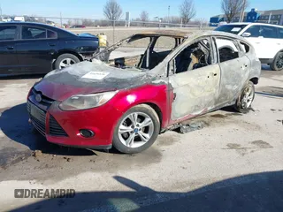 2013 Ford Focus SE with VIN 1FADP3K28DL234412, listed as a IAAI auction lot 41636536 with 1 mi miles. Bid and sale history available at carsss.com. Image 2.