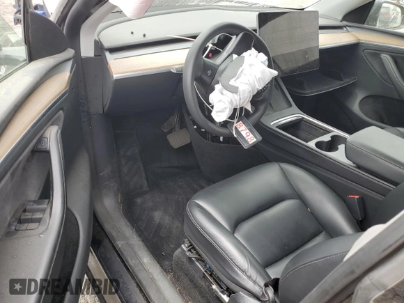 2024 Tesla Model Y Long Range with VIN 7SAYGDEE8RA238798, listed as a Copart auction lot 54401175 with Not provided miles and Salvage title. Bid and sale history available at DreamBid. Image 8.