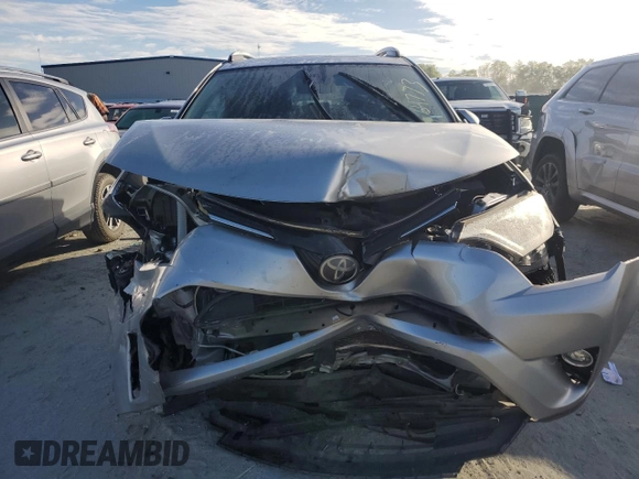 2018 Toyota RAV4 XLE with VIN JTMWFREV0JJ191707, listed as a Copart auction lot 57821575 with Not provided miles and Salvage title. Bid and sale history available at DreamBid. Image 5.