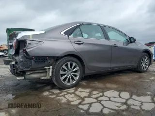2015 Toyota Camry LE with VIN 4T1BD1FK0FU161022, listed as a Copart auction lot 53938835 with 102,193 mi miles and Salvage Title. Bid and sale history available at DreamBid. Image 3.