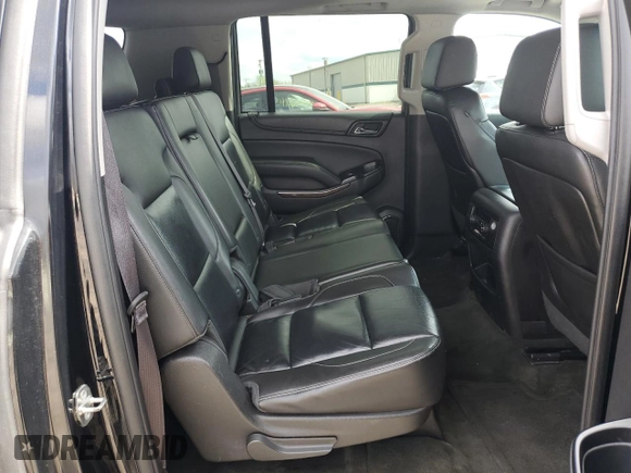 2015 Chevrolet Suburban LT with VIN 1GNSKJKC9FR510682, listed as a Copart auction lot 55427315 with 202,592 mi miles and Salvage Title. Bid and sale history available at DreamBid. Image 11.