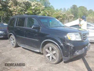 2012 Honda Pilot Touring with VIN 5FNYF4H95CB026191, listed as a IAAI auction lot 42021987 with 229,273 mi miles and . Bid and sale history available at DreamBid. Image 1.
