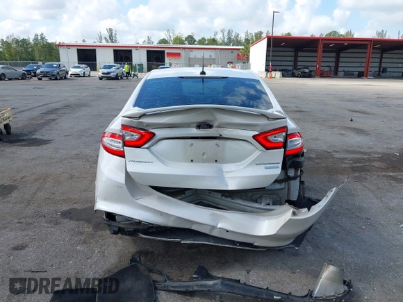 2016 Ford Fusion Titanium with VIN 3FA6P0K96GR400436, listed as a IAAI auction lot 42191256 with 128,447 mi miles and . Bid and sale history available at DreamBid. Image 16.