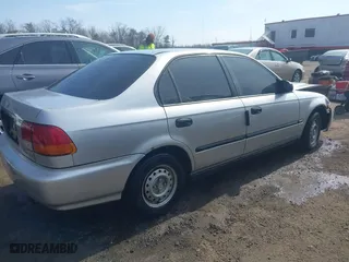 1996 Honda Civic DX with VIN 2HGEJ6627TH550103, listed as a IAAI auction lot 41710877 with 142,608 mi miles. Bid and sale history available at carsss.com. Image 4.