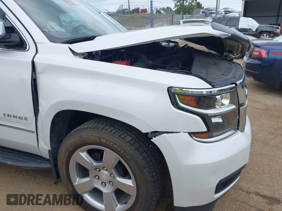 2020 Chevrolet Tahoe LT with VIN 1GNSCBKC4LR181887, listed as a IAAI auction lot 42160821 with 106,757 mi miles and . Bid and sale history available at DreamBid. Image 19.