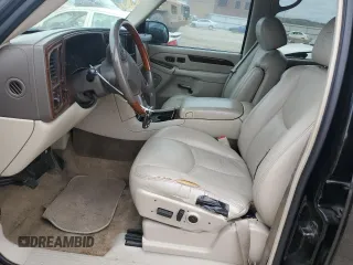 2003 Cadillac Escalade z VIN 1GYEK63N73R277166, wystawiony jako Copart lot #51797955 z przebiegiem 374 735 mil mil oraz Czysty tytuł • Clean title. Historia ofert i sprzedaży dostępna na DreamBid. Obrazek 7.