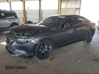2016 Mazda 6 i Grand Touring с VIN JM1GJ1W54G1441347, выставлен на аукционе Copart как лот 55501195 с пробегом 130 855 миль миль и Списание • Salvage title. История ставок и продаж доступна на DreamBid. Изображение 1.