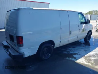 2003 Ford Econoline Cargo with VIN 1FTRE14W03HB60401, listed as a IAAI auction lot 41852847 with 325,883 mi miles. Bid and sale history available at carsss.com. Image 4.