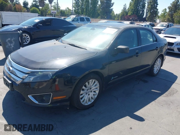 2012 Ford Fusion Hybrid z VIN 3FADP0L3XCR408261, wystawiony jako IAAI lot #42781210 z przebiegiem 281 961 mil mil oraz . Historia ofert i sprzedaży dostępna na DreamBid. Obrazek 2.