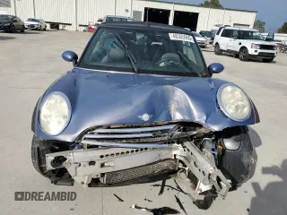 2005 MINI Convertible with VIN WMWRF33555TF62593, listed as a Copart auction lot 48305985 with 172,839 mi miles and Salvage title. Bid and sale history available at DreamBid. Image 5.