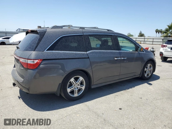 2012 Honda Odyssey Touring с VIN 5FNRL5H9XCB109229, выставлен на аукционе Copart как лот 59885895 с пробегом 153 668 миль миль и Чистый • Clean title. История ставок и продаж доступна на DreamBid. Изображение 3.