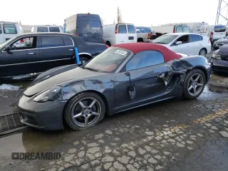 2018 Porsche 718 Boxster z VIN WP0CA2A86JS210697, wystawiony jako Copart lot #42892433 z przebiegiem 31 879 mil mil oraz . Historia ofert i sprzedaży dostępna na DreamBid. Obrazek 1.