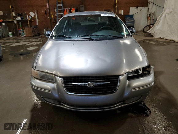 1999 Chrysler Cirrus LXi z VIN 1C3EJ56H5XN516255, wystawiony jako Copart lot #48552575 z przebiegiem 69 616 mil mil oraz Szkody całkowita. Historia ofert i sprzedaży dostępna na DreamBid. Obrazek 5.
