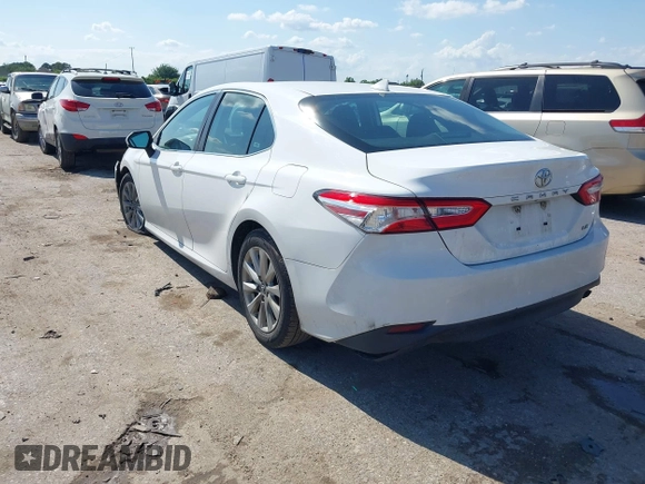 2019 Toyota Camry LE with VIN 4T1B11HK4KU180995, listed as a IAAI auction lot 42088737 with 133,813 mi miles and . Bid and sale history available at DreamBid. Image 3.
