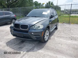 2012 BMW X5 35i z VIN 5UXZV4C5XCL990728, wystawiony jako IAAI lot #42386095 z przebiegiem 124 613 mil mil oraz . Historia ofert i sprzedaży dostępna na DreamBid. Obrazek 17.