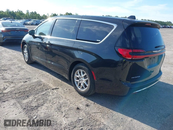 2023 Chrysler Pacifica Touring L with VIN 2C4RC1BG1PR606566, listed as a IAAI auction lot 42615498 with 42,980 mi miles and . Bid and sale history available at DreamBid. Image 3.