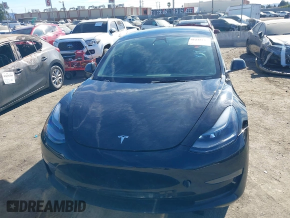 2022 Tesla Model 3 Long Range with VIN 5YJ3E1EB1NF313954, listed as a IAAI auction lot 41248187 with 31,247 mi miles and . Bid and sale history available at DreamBid. Image 11.