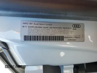2018 Audi R8 z VIN WUAVACFX1J7900121, wystawiony jako Copart lot #75092964 z przebiegiem Nie podano mil oraz Szkody całkowita. Historia ofert i sprzedaży dostępna na DreamBid. Obrazek 13.