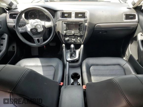 2014 Volkswagen Jetta SEL with VIN 3VWL17AJ2EM440524, listed as a Copart auction lot 61206685 with 104,987 mi miles and Salvage title. Bid and sale history available at DreamBid. Image 8.