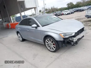 2015 Audi A3 1.8T Premium with VIN WAUACGFF3F1028231, listed as a IAAI auction lot 41586957 with 122,927 mi miles. Bid and sale history available at carsss.com. Image 1.