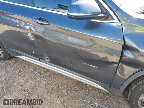 2017 BMW X1 xDrive28i with VIN WBXHT3C31H5F80056, listed as a IAAI auction lot 42049925 with 64,471 mi miles and . Bid and sale history available at DreamBid. Image 17.