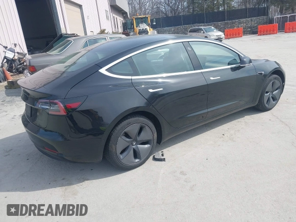 2020 Tesla Model 3 Standard Range Plus with VIN 5YJ3E1EAXLF643807, listed as a IAAI auction lot 41789406 with 49,256 mi miles. Bid and sale history available at carsss.com. Image 4.