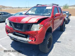 2015 Nissan Frontier SL with VIN 1N6AD0EV1FN711521, listed as a IAAI auction lot 42525352 with 203,114 mi miles and . Bid and sale history available at DreamBid. Image 18.