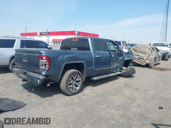 2014 GMC Sierra 1500 SLT with VIN 3GTU2VEC9EG188869, listed as a IAAI auction lot 41876520 with 147,367 mi miles and . Bid and sale history available at DreamBid. Image 4.