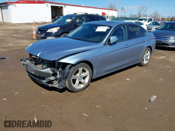 2014 BMW 3 Series 328i with VIN WBA3C1C56EAV79706, listed as a IAAI auction lot 41807033 with 104,478 mi miles. Bid and sale history available at carsss.com. Image 2.