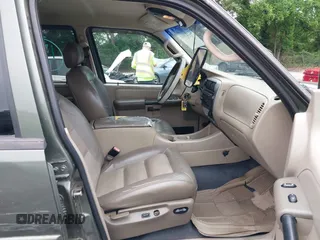 2003 Ford Explorer Sport Trac XLS with VIN 1FMZU67E03UB99141, listed as a IAAI auction lot 42323864 with 220,625 mi miles and . Bid and sale history available at DreamBid. Image 5.