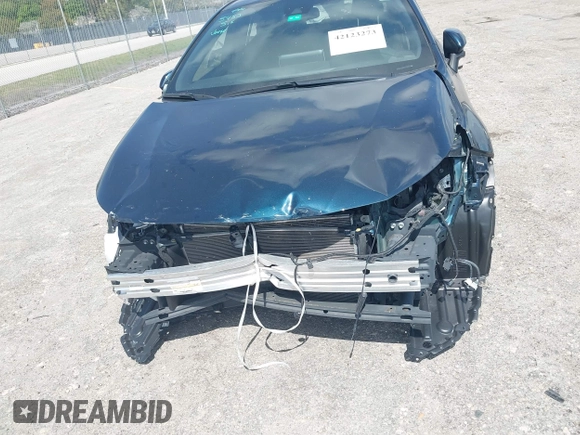 2019 Toyota Corolla Hatchback SE with VIN JTNK4RBE3K3061589, listed as a IAAI auction lot 42123273 with 90,491 mi miles. Bid and sale history available at carsss.com. Image 6.