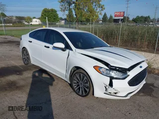 2020 Ford Fusion SE z VIN 3FA6P0T93LR247572, wystawiony jako IAAI lot #40481880 z przebiegiem 59 141 mil mil oraz . Historia ofert i sprzedaży dostępna na DreamBid. Obrazek 1.
