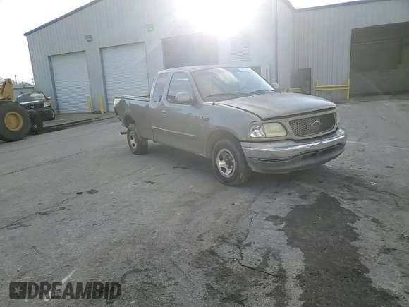 2003 Ford F-150 XL with VIN 1FTRX17283NA46215, listed as a Copart auction lot 85194094 with 168,415 mi miles and Salvage title. Bid and sale history available at DreamBid. Image 10.
