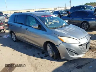 2013 Mazda 5 Sport z VIN JM1CW2BL1D0154494, wystawiony jako IAAI lot #41383673 z przebiegiem 219 520 mil mil oraz . Historia ofert i sprzedaży dostępna na DreamBid. Obrazek 1.