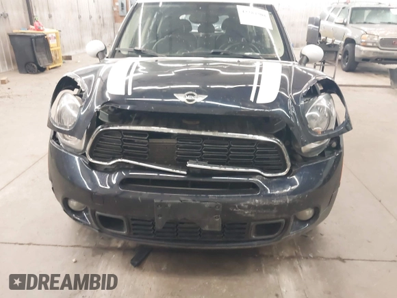 2014 MINI Countryman S with VIN WMWZC5C56EWP38017, listed as a IAAI auction lot 42287308 with 151,780 mi miles and . Bid and sale history available at DreamBid. Image 6.