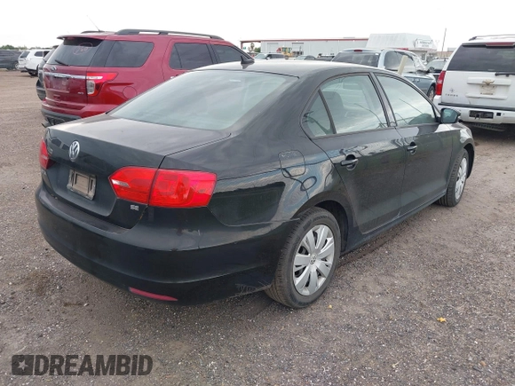2014 Volkswagen Jetta SE with VIN 3VWD07AJ6EM294233, listed as a IAAI auction lot 42503674 with 80,981 mi miles and . Bid and sale history available at DreamBid. Image 4.