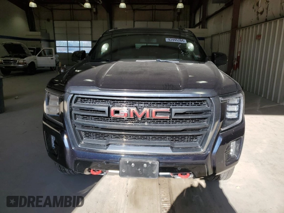 2021 GMC Yukon AT4 with VIN 1GKS2CKD7MR418968, listed as a Copart auction lot 82445284 with 73,660 mi miles and Salvage Title. Bid and sale history available at carsss.com. Image 5.