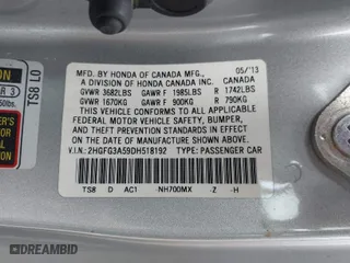 2013 Honda Civic Cpe LX with VIN 2HGFG3A59DH518192, listed as a IAAI auction lot 41652389 with 138,257 mi miles. Bid and sale history available at carsss.com. Image 9.