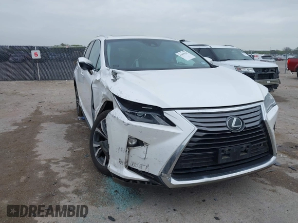 2018 Lexus RX 350L Premium z VIN JTJDZKCAXJ2010125, wystawiony jako IAAI lot #41899420 z przebiegiem 113 995 mil mil oraz . Historia ofert i sprzedaży dostępna na DreamBid. Obrazek 6.