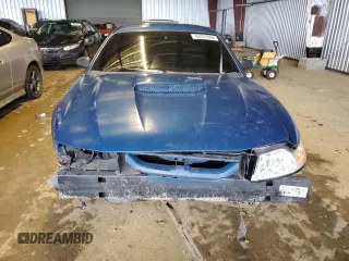2000 Ford Mustang GT with VIN 1FAFP42X5YF115568, listed as a Copart auction lot 84767994 with 185,351 mi miles and Salvage Title. Bid and sale history available at carsss.com. Image 5.