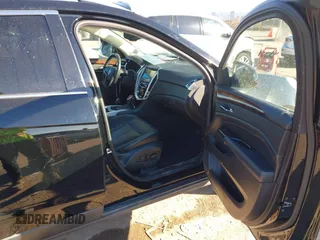 2016 Cadillac SRX Luxury Collection with VIN 3GYFNEE39GS583306, listed as a IAAI auction lot 41312161 with 98,831 mi miles. Bid and sale history available at carsss.com. Image 5.