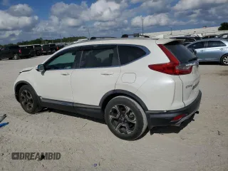 2018 Honda CR-V Touring with VIN 5J6RW1H9XJL010690, listed as a Copart auction lot 53554015 with 90,158 mi miles and Salvage Title. Bid and sale history available at DreamBid. Image 2.