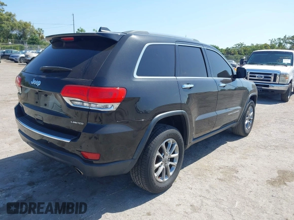 2015 Jeep Grand Cherokee Limited with VIN 1C4RJFBG8FC790575, listed as a IAAI auction lot 42124709 with 248,827 mi miles. Bid and sale history available at carsss.com. Image 4.