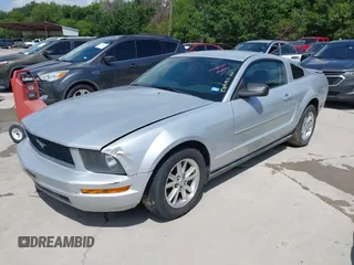 2007 Ford Mustang Deluxe with VIN 1ZVFT80N475296355, listed as a IAAI auction lot 42748184 with 198,104 mi miles and . Bid and sale history available at DreamBid. Image 2.